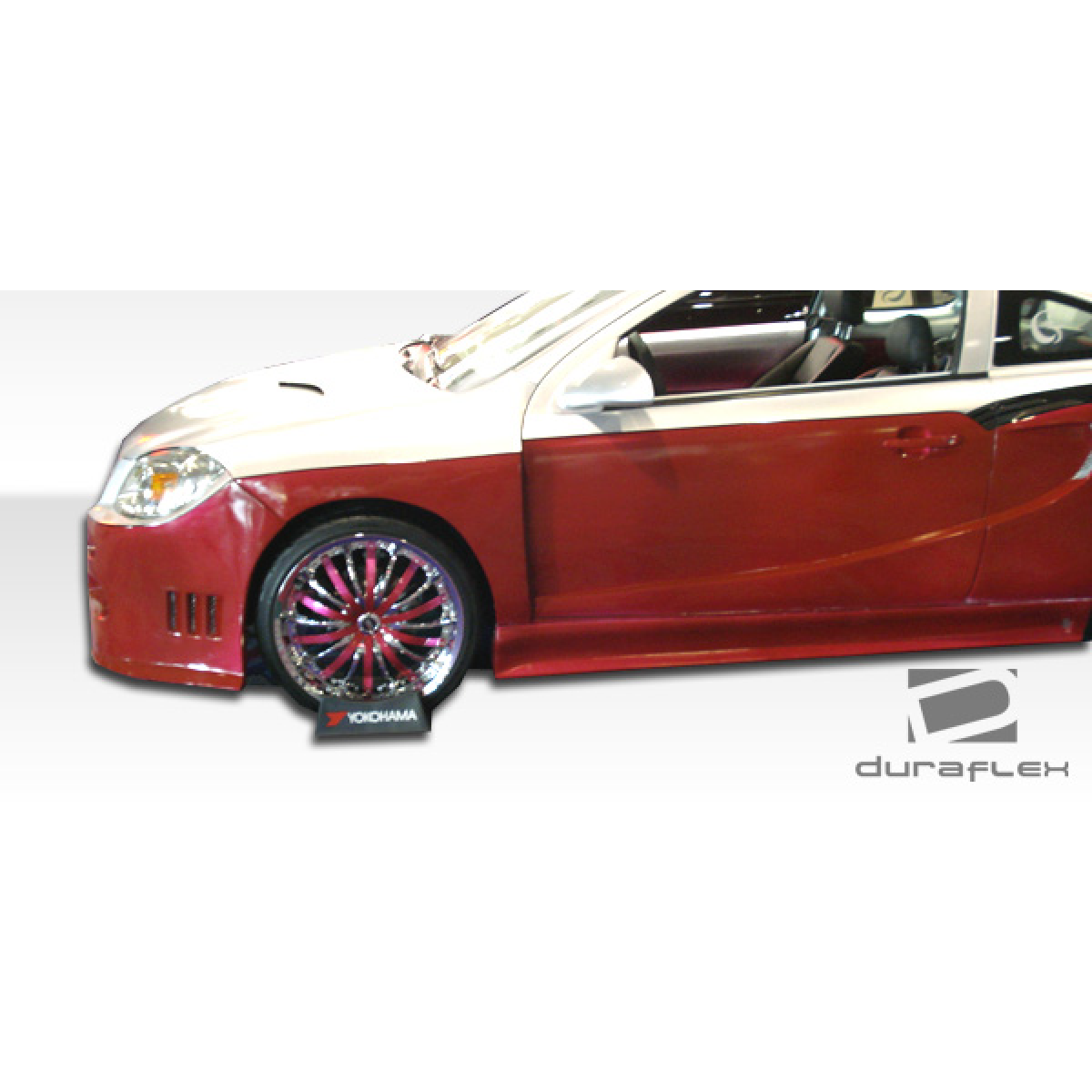 Modify your Pontiac G5 2007 with our Exterior/Side Skirts - Side angle view of car showing body kit parts