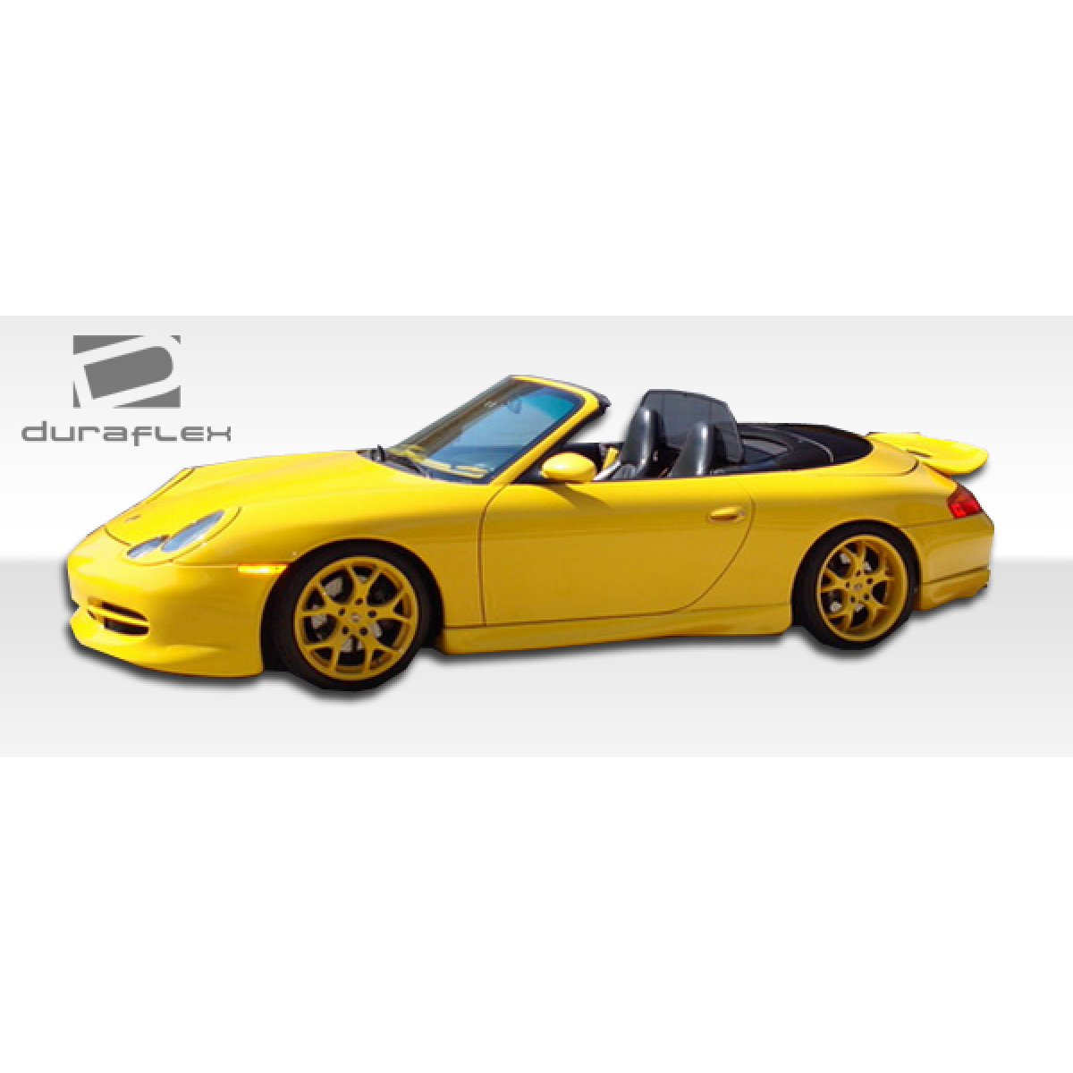 Modify your Porsche 911 1999 with our Exterior/Complete Body Kits - Angled view of a bright yellow Porsche 911 convertible