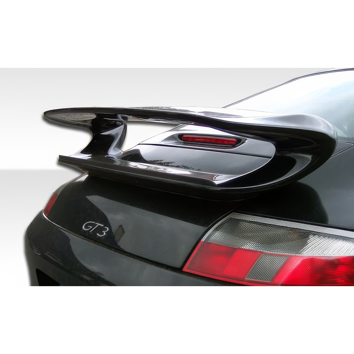 Modify your Porsche 911 1999 with our Exterior/Complete Body Kits - Rear angle view of a Porsche 911 wing