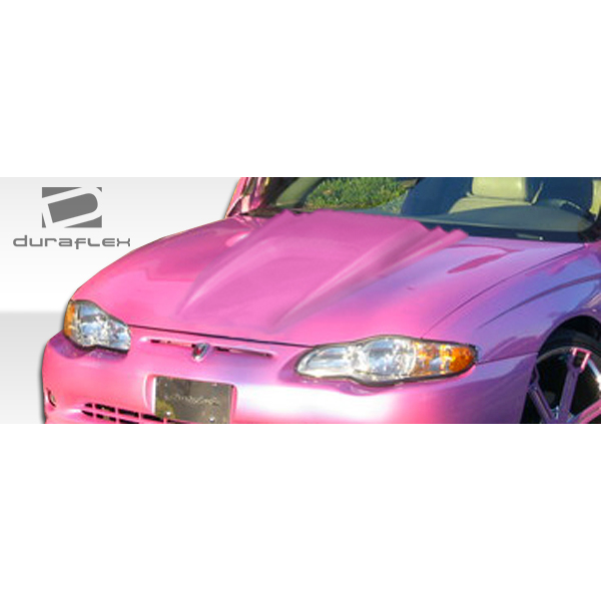 Modify your Chevrolet Monte Carlo 2000 with our Exterior/Hoods - Front angle showing pink hood of vehicle