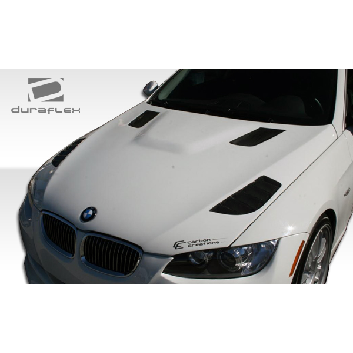 Modify your BMW 3-Series 2007 with our Exterior/Hoods - Front view of hood at a slight angle