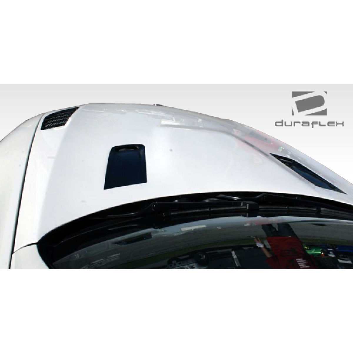 Modify your BMW 3-Series 2007 with our Exterior/Hoods - Image shows part from a top angle during daytime