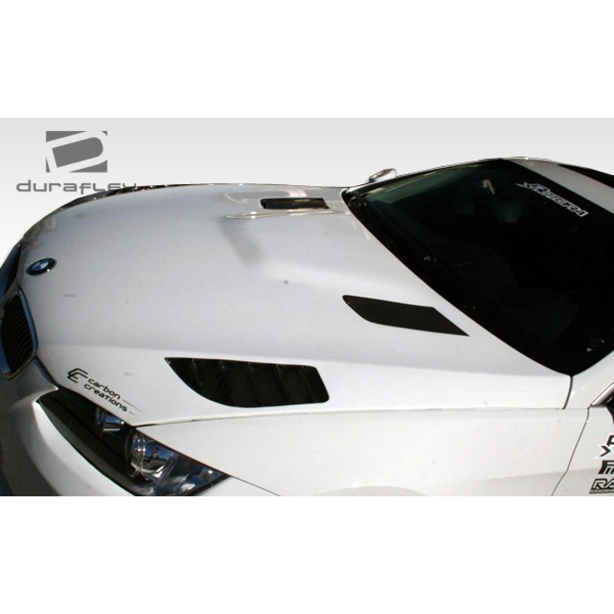 Modify your BMW 3-Series 2007 with our Exterior/Hoods - View is from a slight front angle of the hood