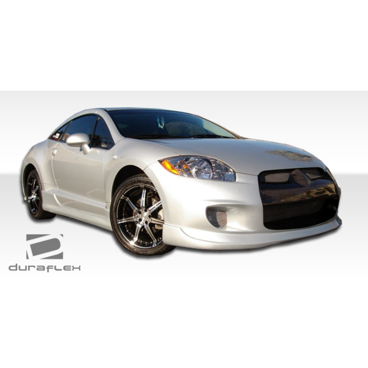 Modify your Mitsubishi Eclipse 2006 with our Exterior/Complete Body Kits - Side angle view of a silver Mitsubishi Eclipse