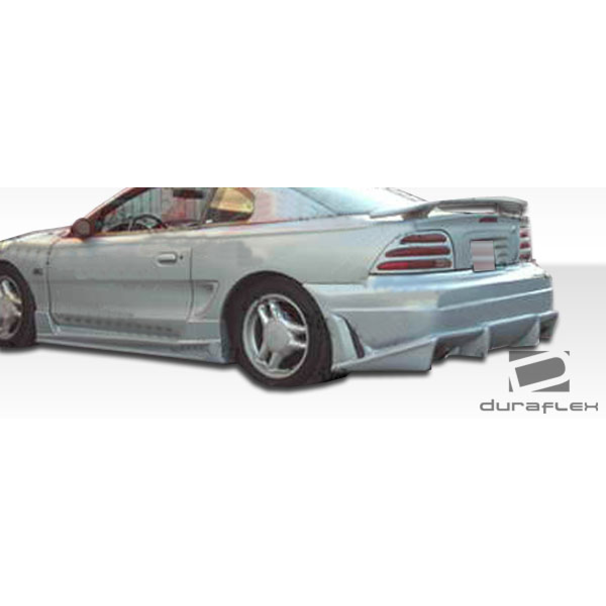 Modify your Ford Mustang 1994 with our Exterior/Complete Body Kits - Side angle view of vehicle with added body kit