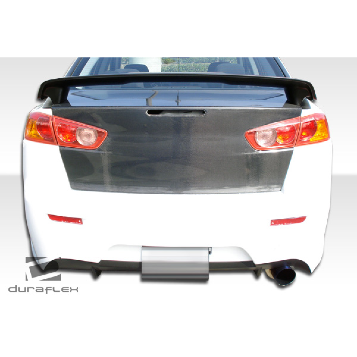 Modify your Mitsubishi Lancer 2008 with our Exterior/Rear Bumpers or Lips - Rear view at low angle showcasing bumper design