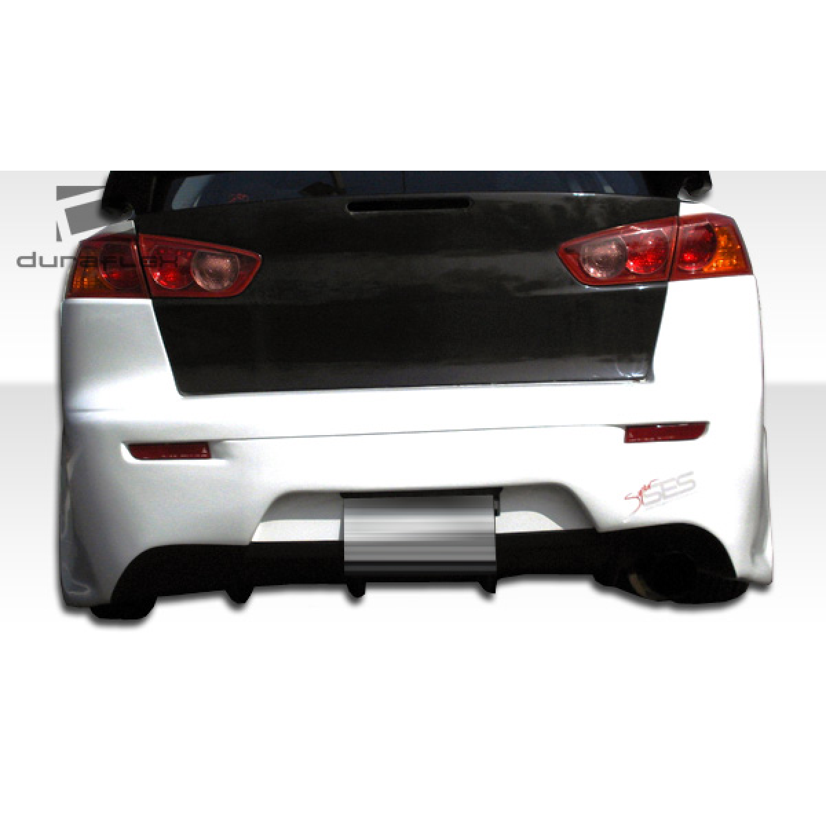 Modify your Mitsubishi Lancer 2008 with our Exterior/Rear Bumpers or Lips - Rear view of the bumper at a slight angle