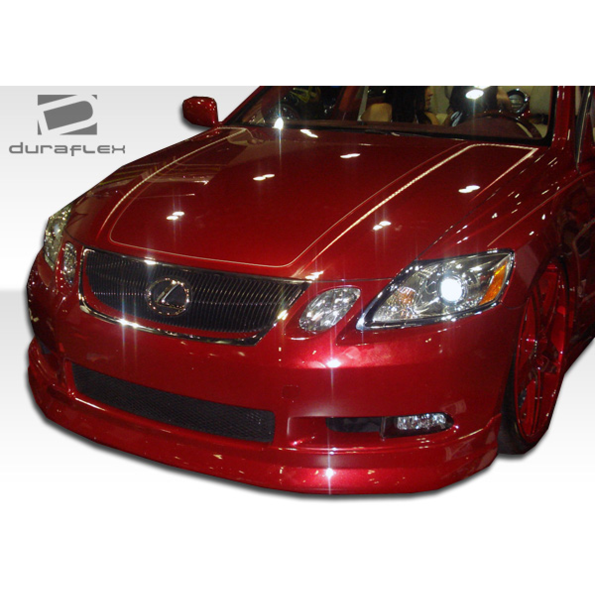 Modify your Lexus GS300 2006 with our Exterior/Complete Body Kits - Front angle view of red Lexus GS300 with lip spoiler