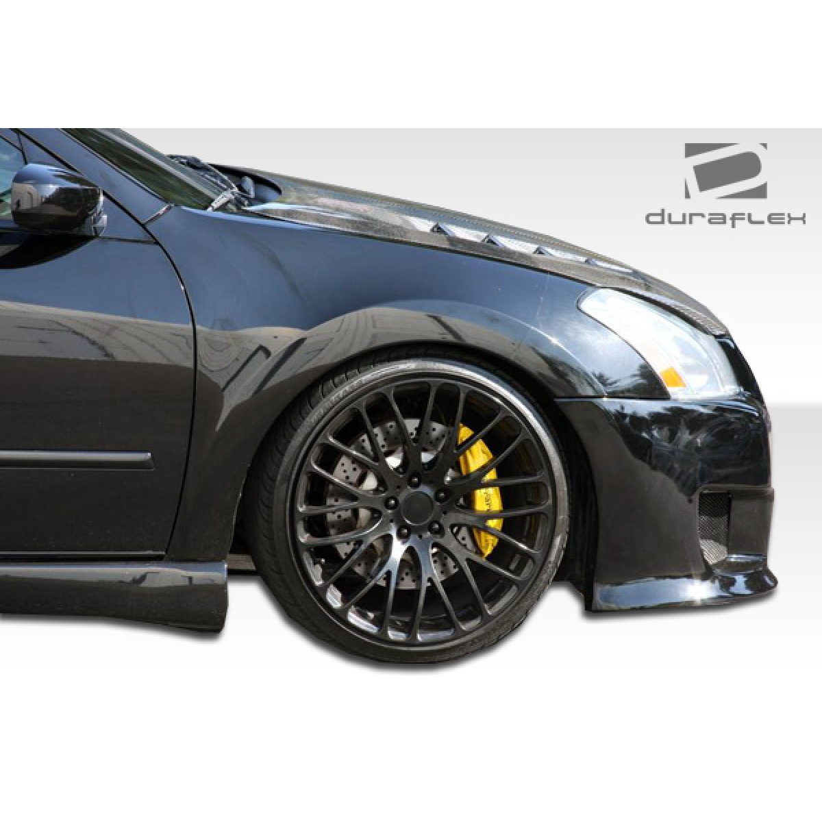 Modify your Nissan GT-R 2004 with our Exterior/Complete Body Kits - The angle shows the front side of the vehicle