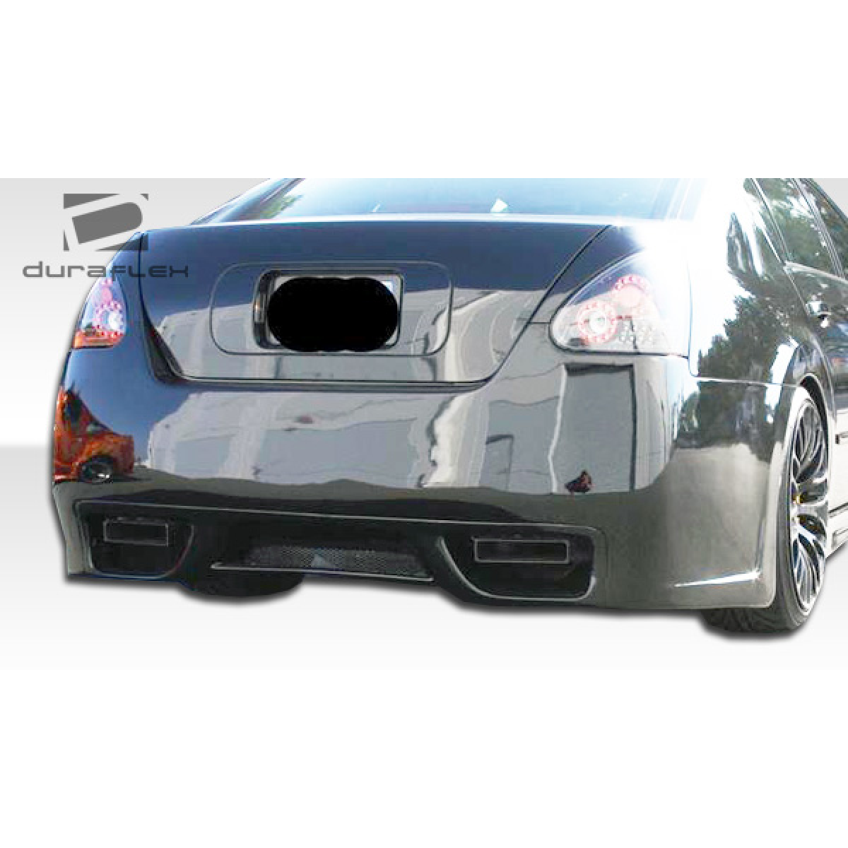 Modify your Nissan GT-R 2004 with our Exterior/Rear Bumpers or Lips - Rear angle showing the bumper details clearly