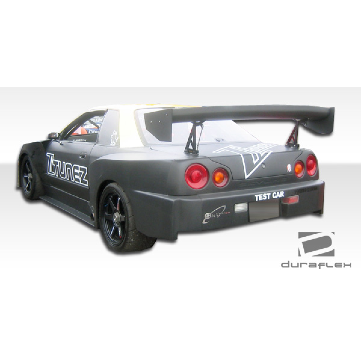 Modify your Nissan Skyline 1989 with our Exterior/Side Skirts - Rear three quarter angle view of vehicle