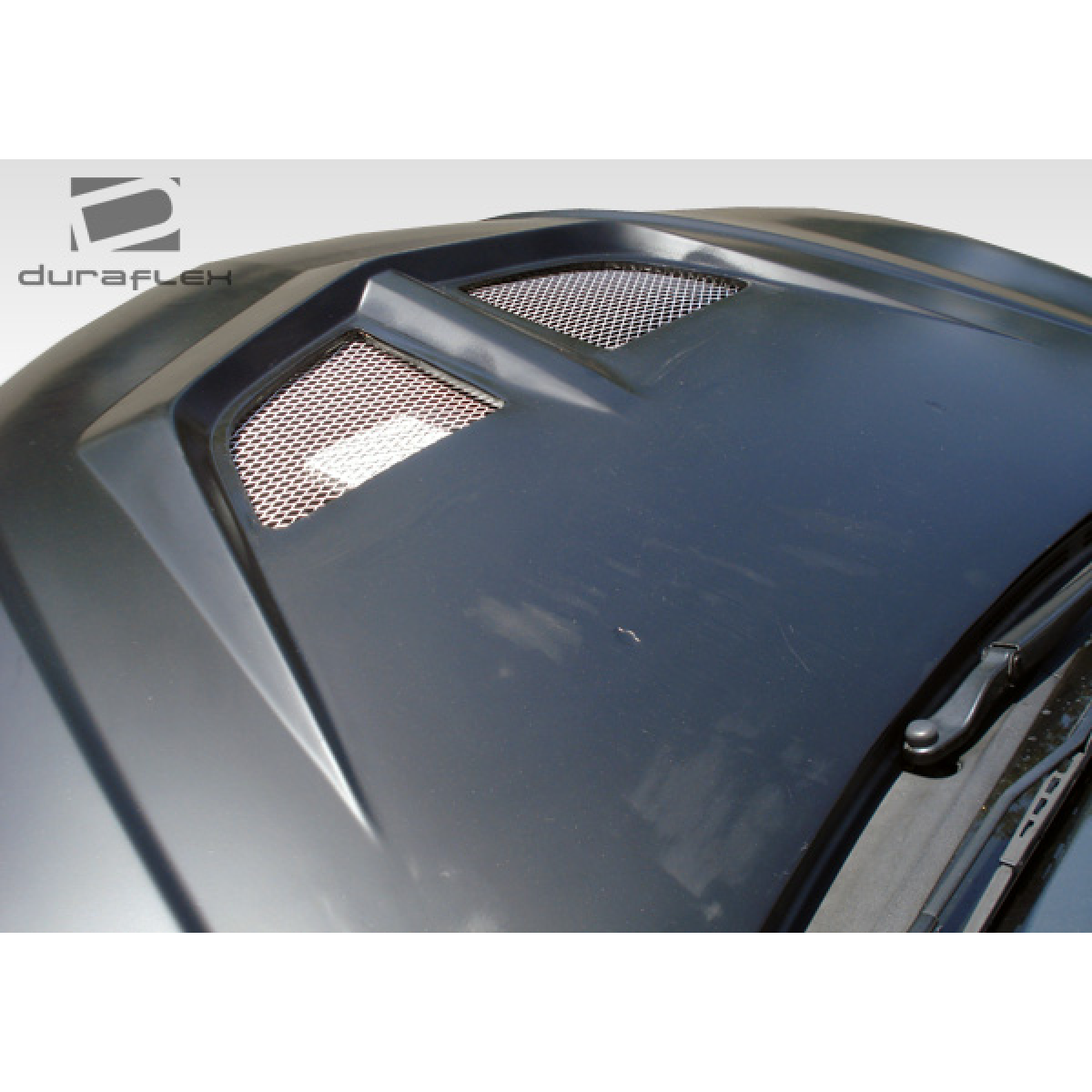 Modify your Mazda 3 2004 with our Exterior/Hoods - Top down view of hood at a slight angle