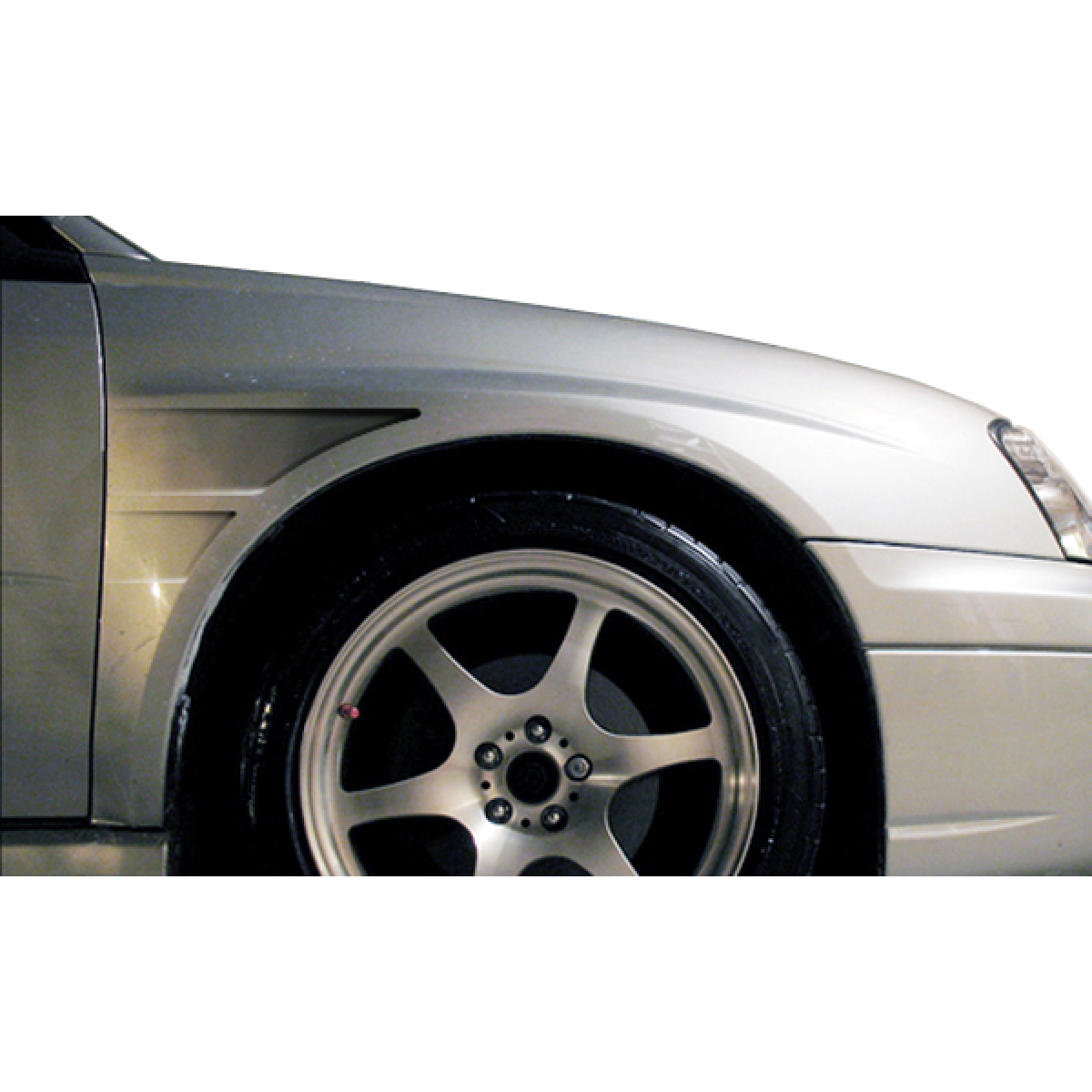 Modify your Subaru Impreza 2004 with our Exterior/Fenders - Front quarter view angle of vehicle fender