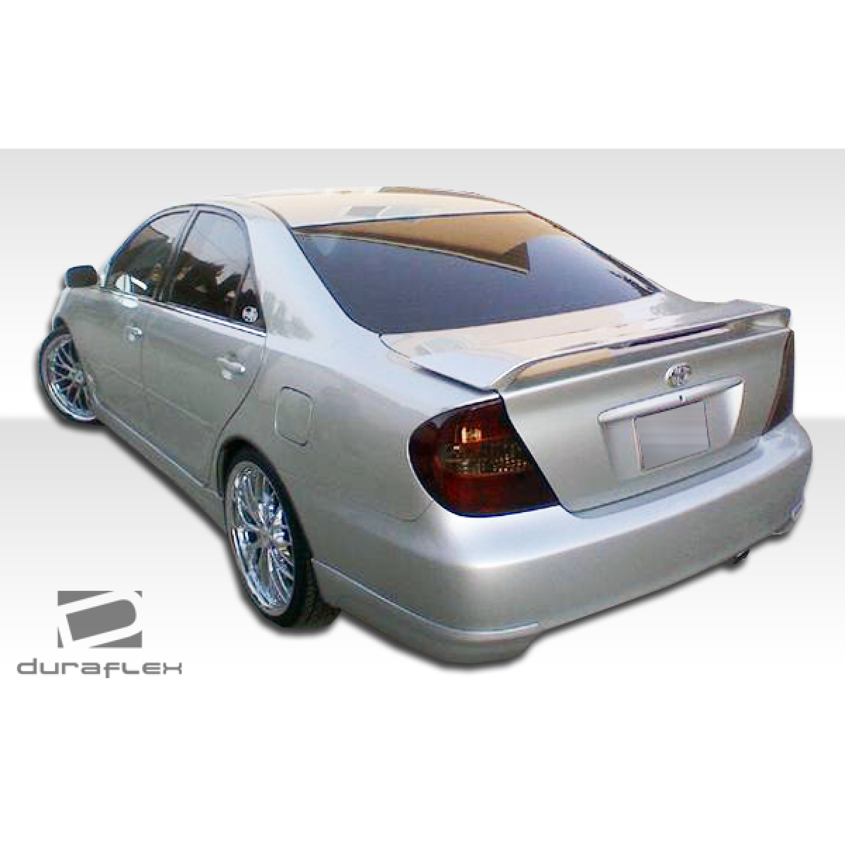 Modify your Toyota Camry 2002 with our Exterior/Complete Body Kits - The image shows a rear angle view of the car