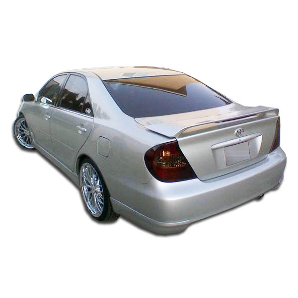 Modify your Toyota Camry 2002 with our Exterior/Rear Bumpers or Lips - Rear angle view of the vehicle