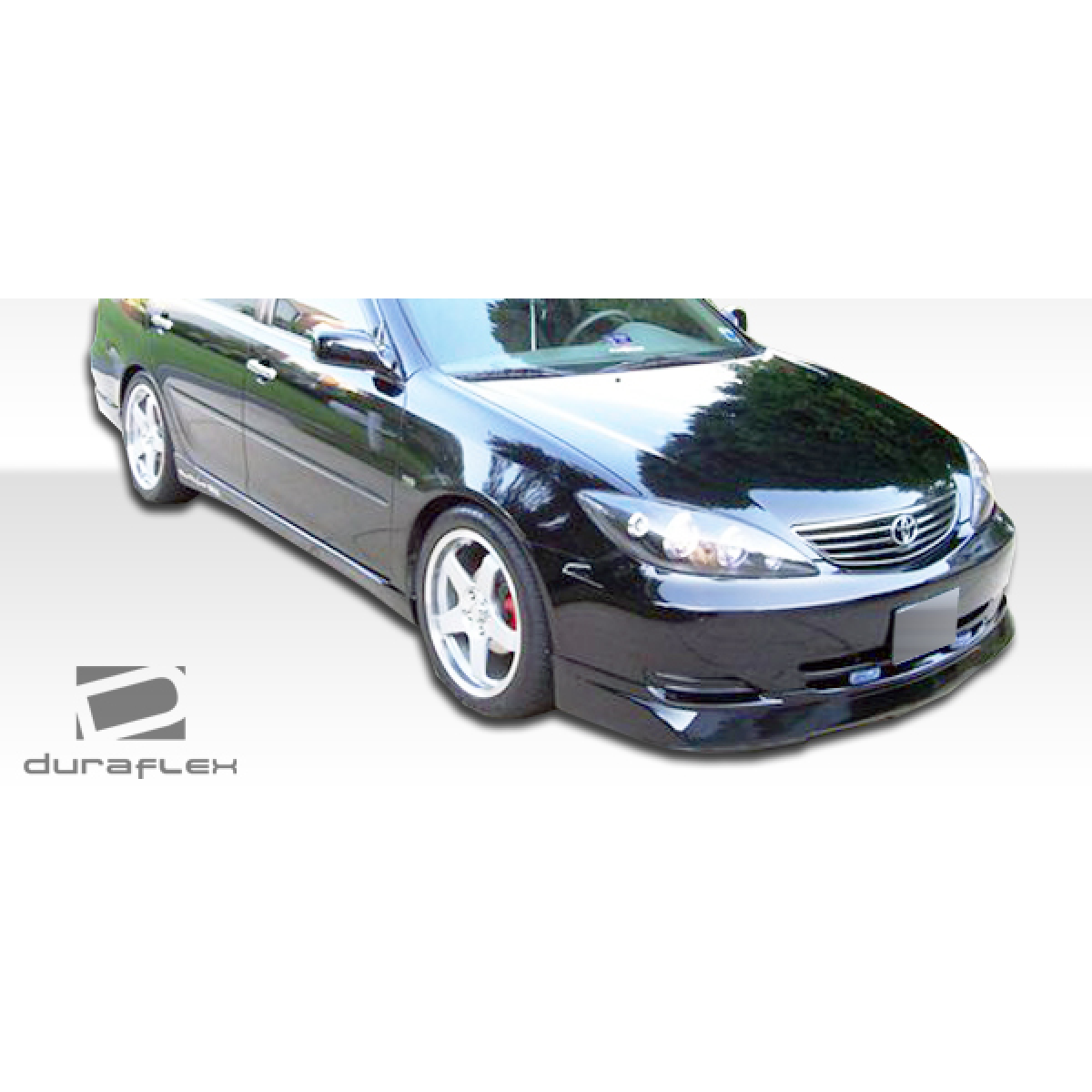 Modify your Toyota Camry 2002 with our Exterior/Complete Body Kits - Angled view showcasing body kit on a black car