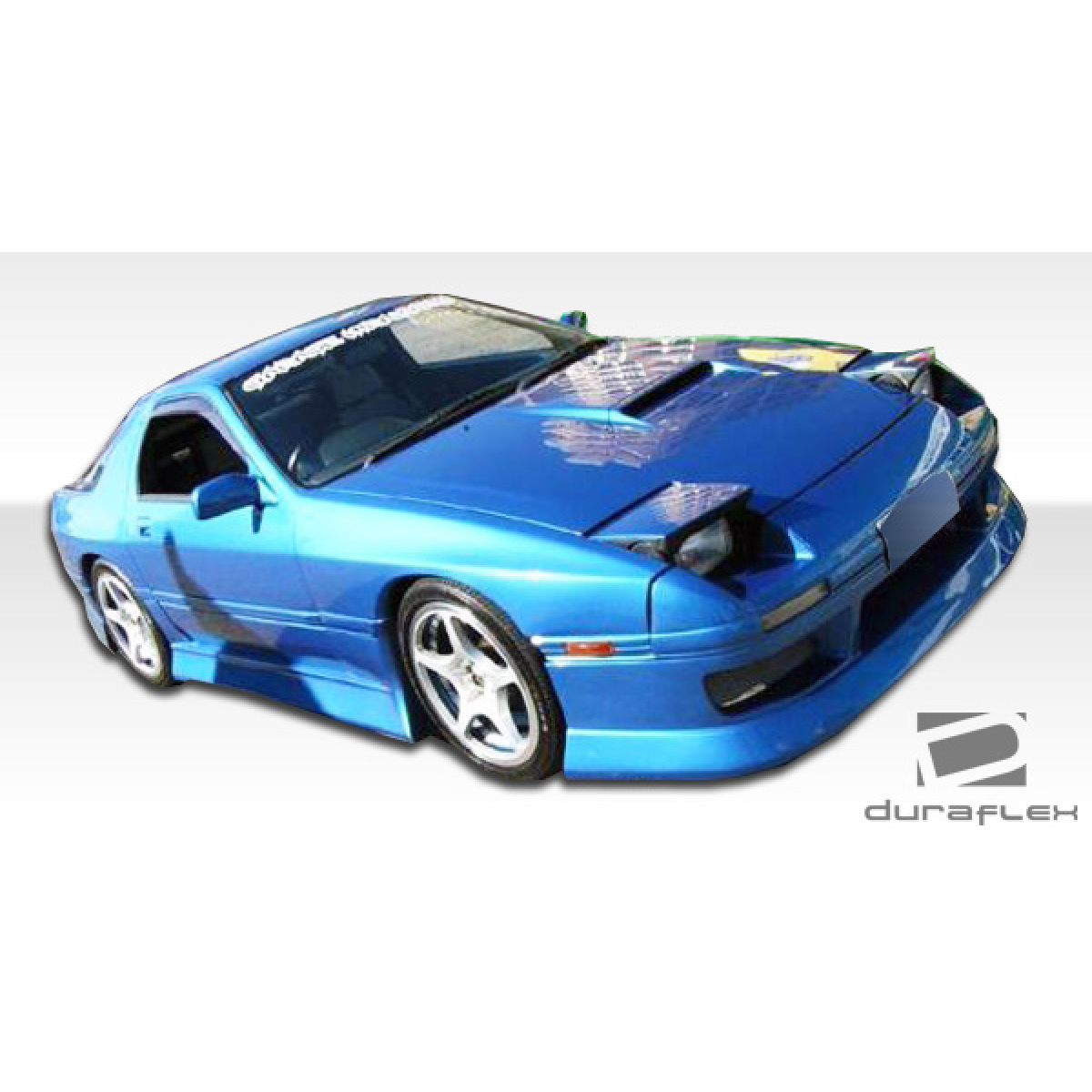 Modify your Mazda RX-7 1986 with our Exterior/Front Bumpers or Lips - Front left angle view of the car