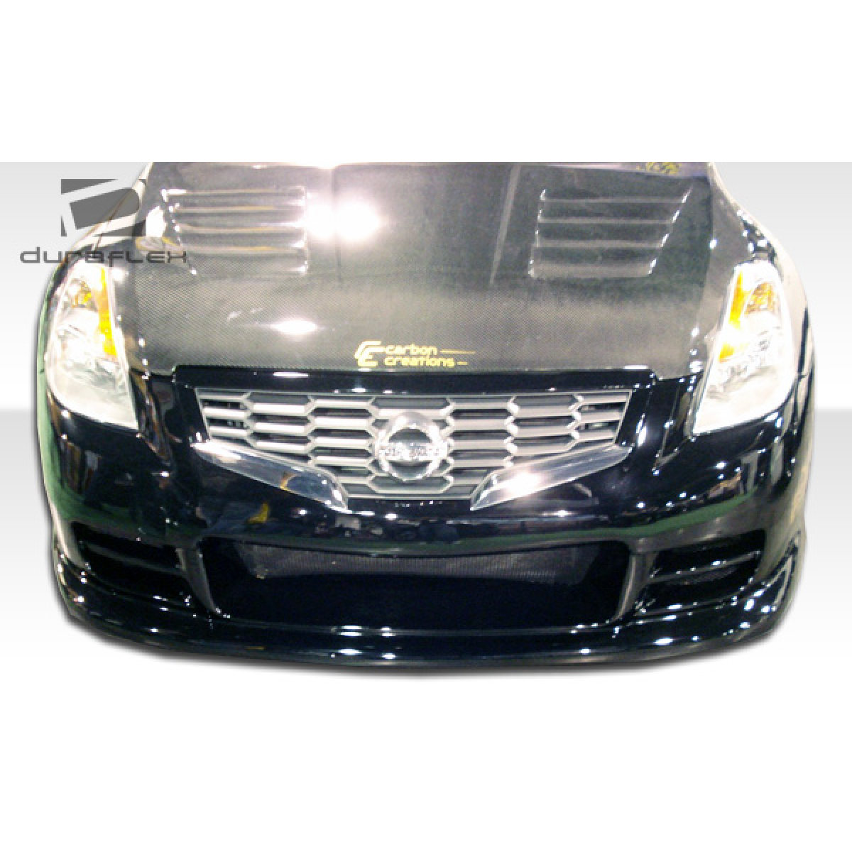 Modify your Nissan Altima 2008 with our Exterior/Front Bumpers or Lips - Front view of the bumper part at eye level