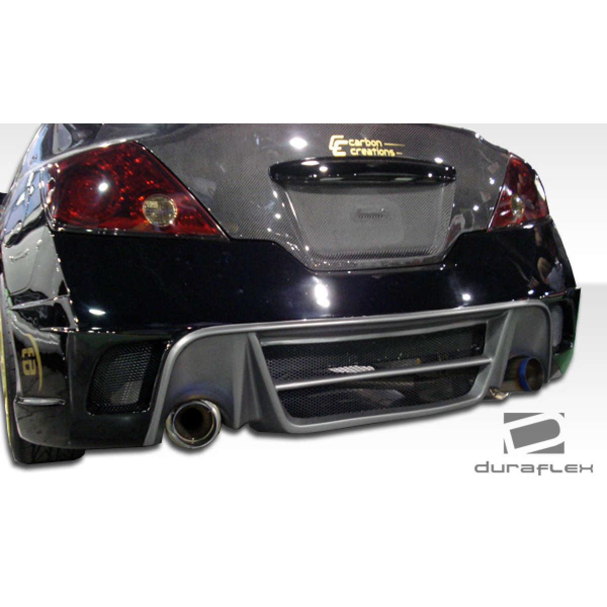 Modify your Nissan Altima 2008 with our Exterior/Rear Bumpers or Lips - Rear view at a slight angle showing bumper design