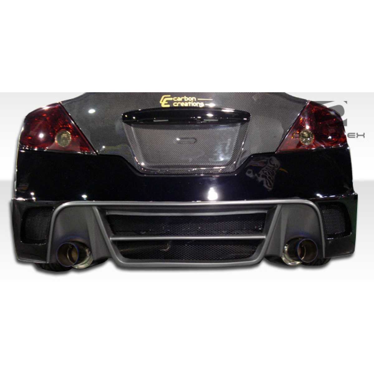 Modify your Nissan Altima 2008 with our Exterior/Rear Bumpers or Lips - Rear view of vehicle part at slight angle