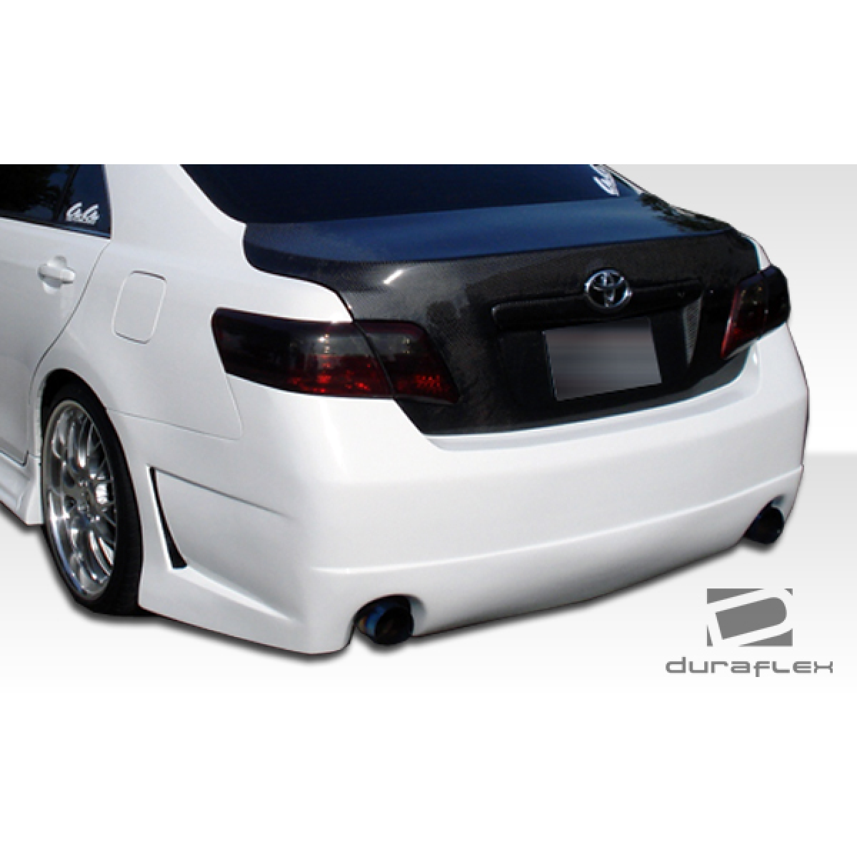 Modify your Toyota Camry 2007 with our Exterior/Rear Bumpers or Lips - Back angle view of rear bumper on white car