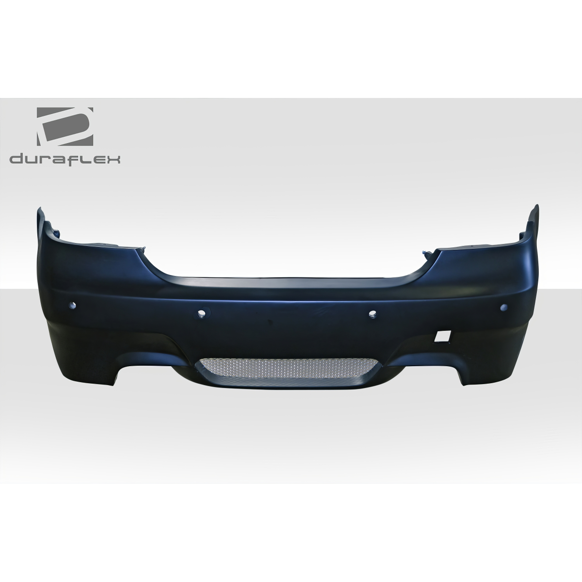 Modify your BMW 5-Series 2004 with our Exterior/Rear Bumpers or Lips - Front view of rear bumper at slight angle