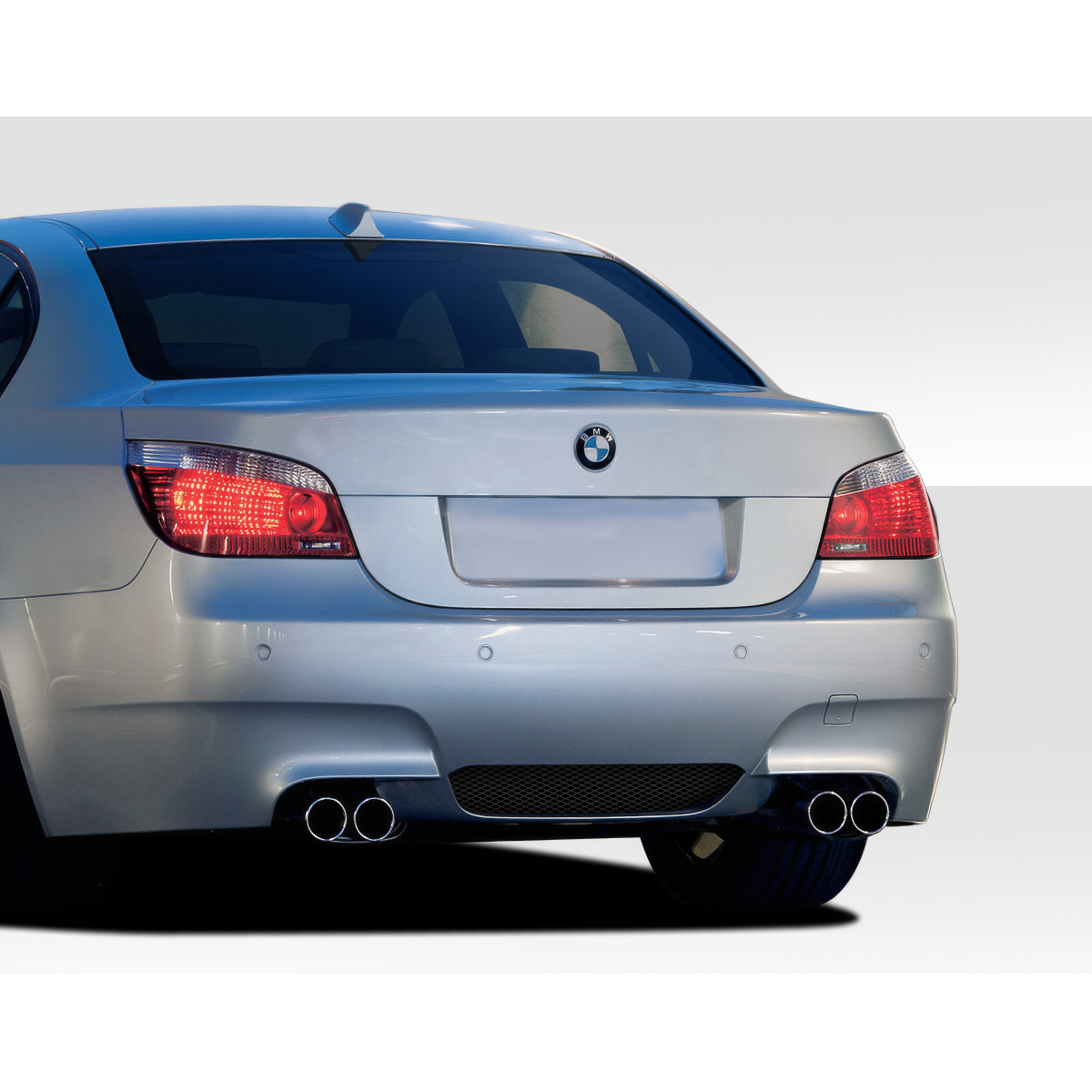 Modify your BMW 5-Series 2004 with our Exterior/Rear Bumpers or Lips - Rear view of vehicle at a slight angle