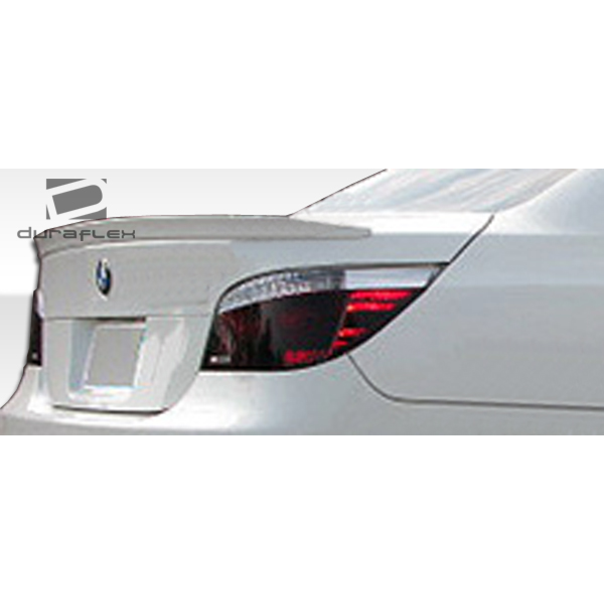 Modify your BMW 5-Series 2004 with our Exterior/Complete Body Kits - Angled view of rear trunk lid with spoiler