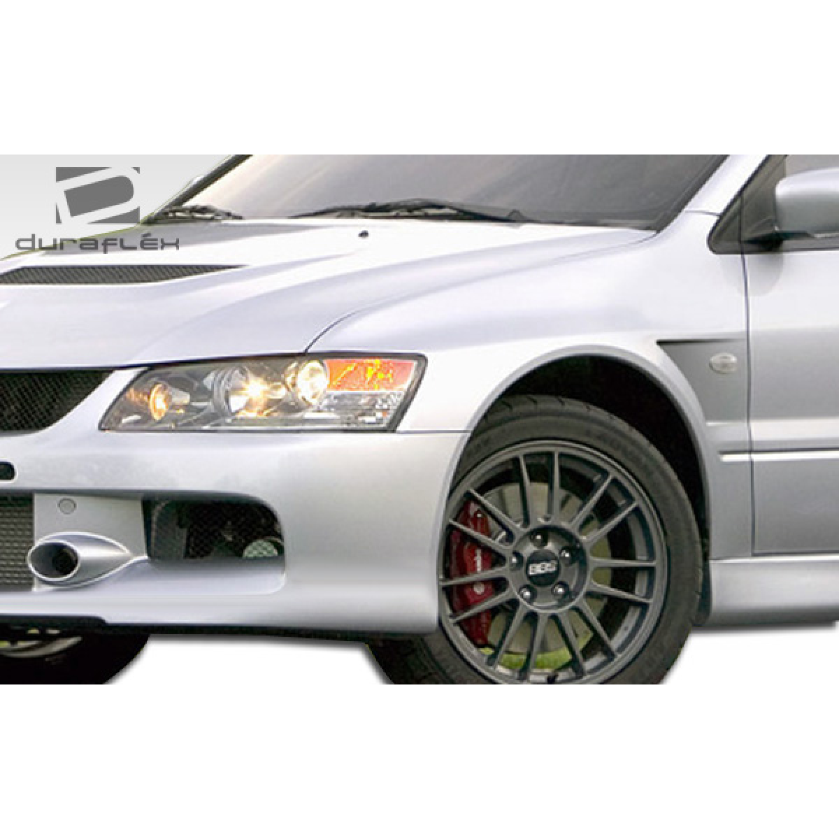 Modify your Mitsubishi Evolution 2003 with our Exterior/Front Bumpers or Lips - Angled view of the car's front bumper