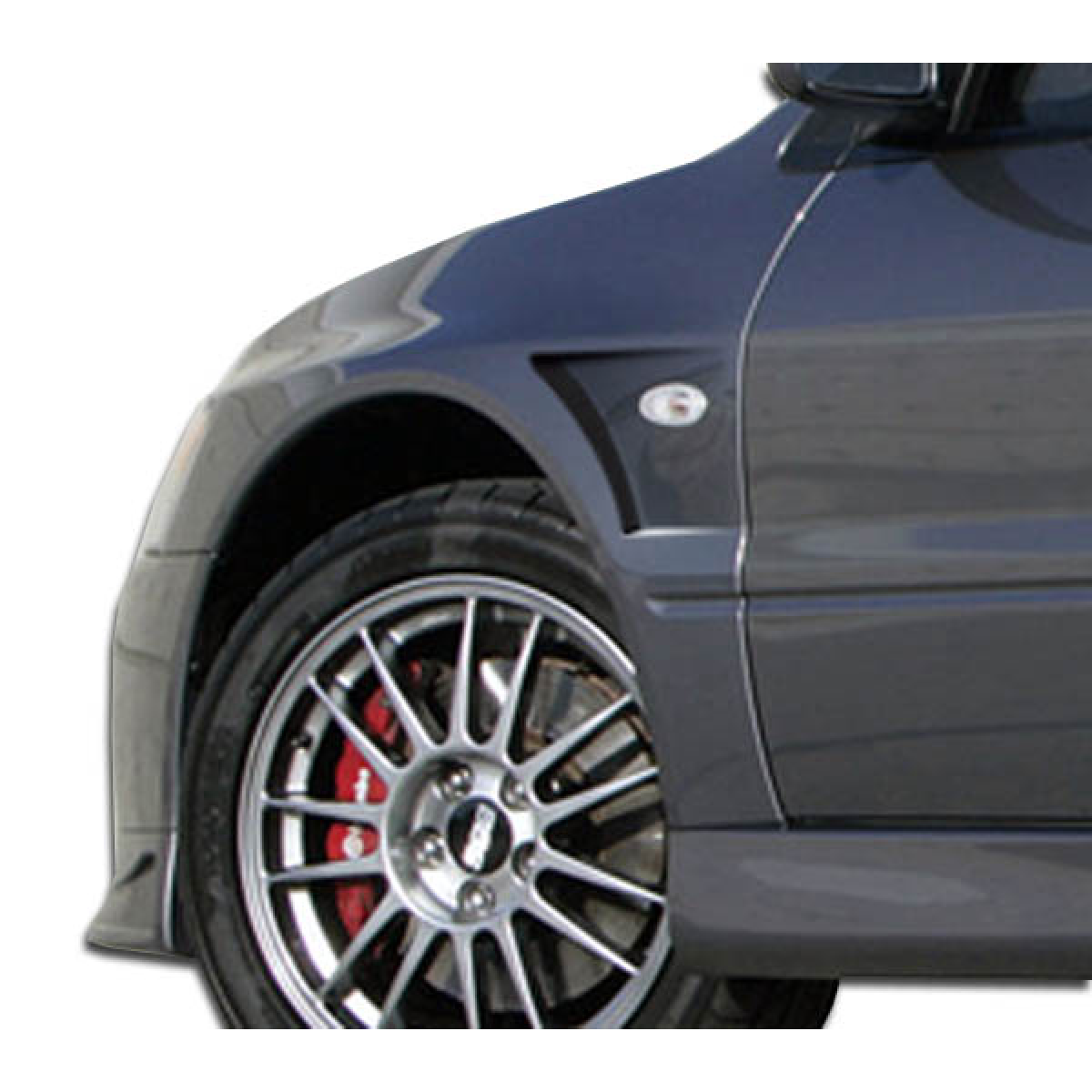 Modify your Mitsubishi Evolution 2003 with our Exterior/Fenders - View of fender and wheel from slight front angle