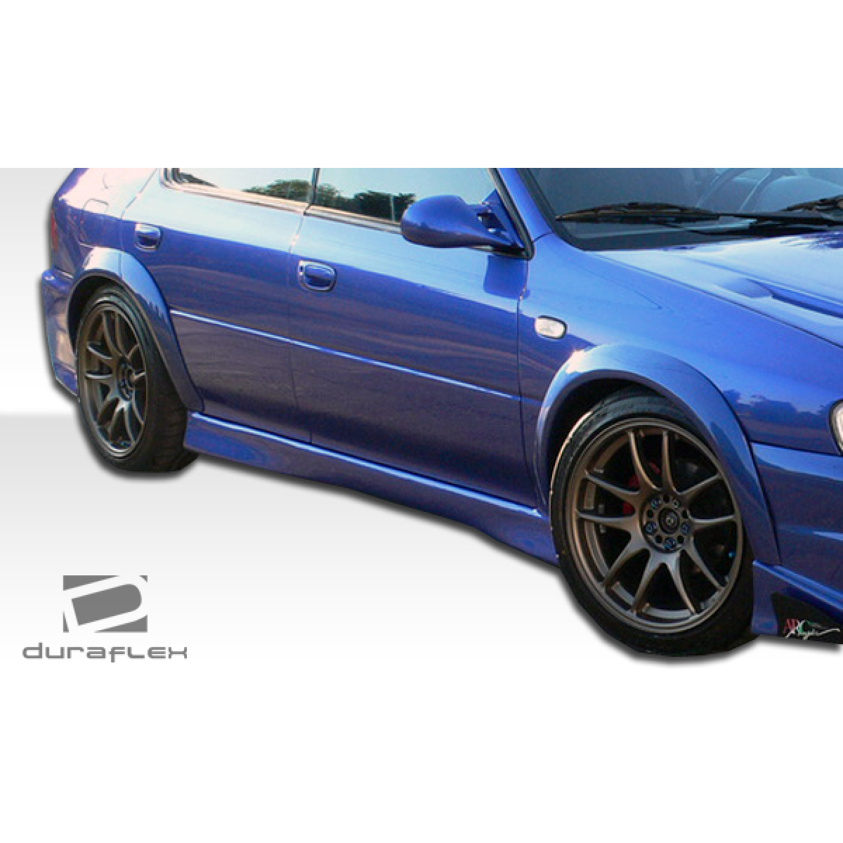 Modify your Subaru Impreza 1993 with our Exterior/Side Skirts - Side view showcasing side skirts installed