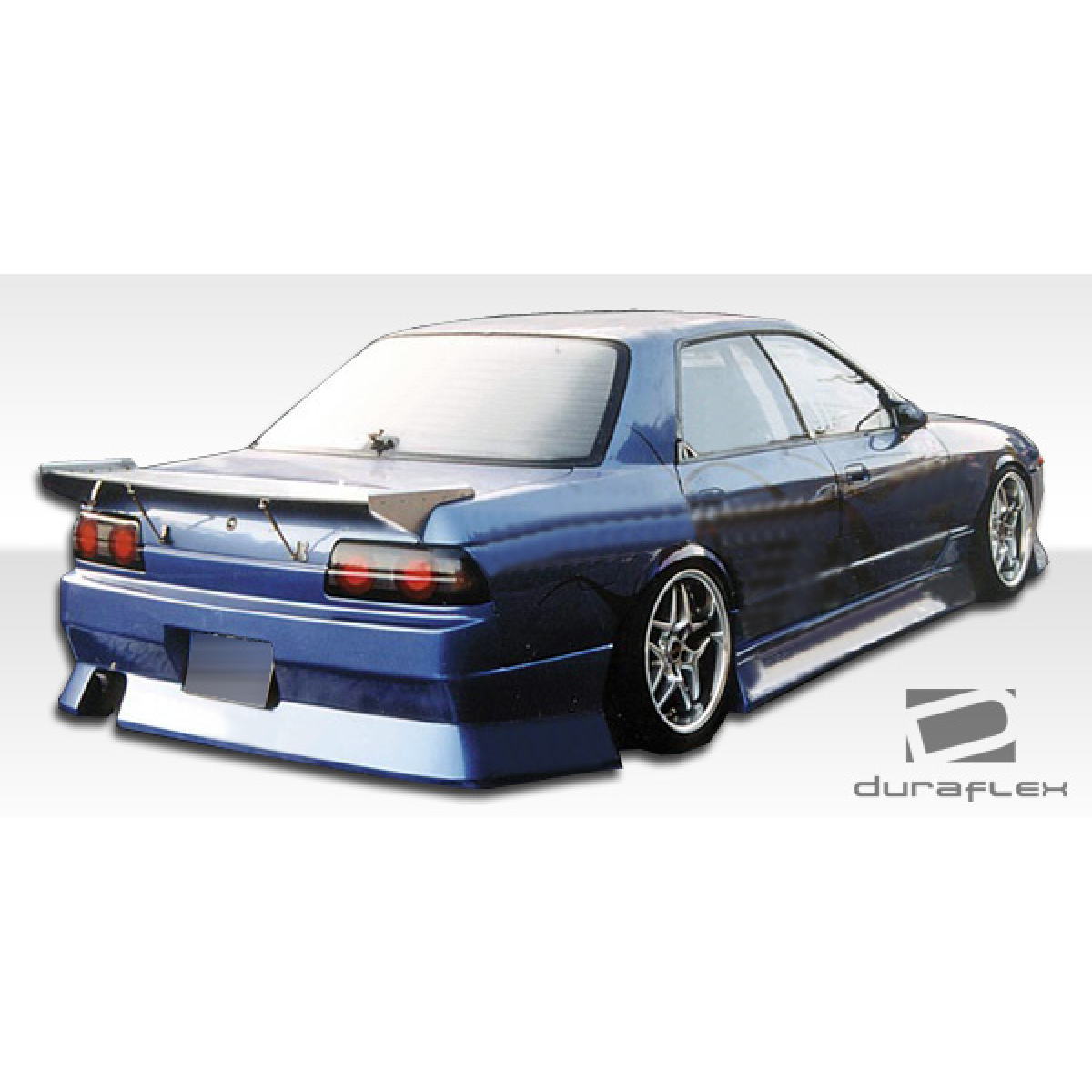 Modify your Nissan Skyline 1989 with our Exterior/Rear Bumpers or Lips - Rear view of car at a slight angle