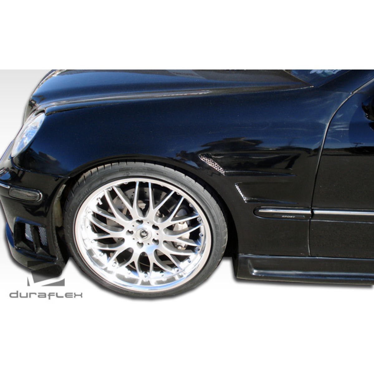 Modify your Mercedes-Benz C230 2001 with our Exterior/Fenders - Side angle of a black Mercedes C230 fender