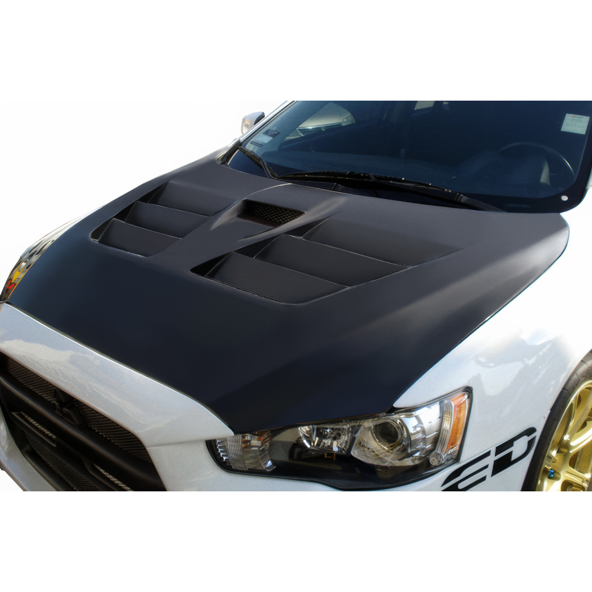 Modify your Mitsubishi Evolution 2008 with our Exterior/Hoods - Viewed from slightly above and to the front