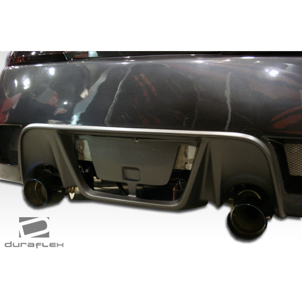 Modify your Infiniti G37 2008 with our Exterior/Complete Body Kits - Rear view angle showcasing bumper design