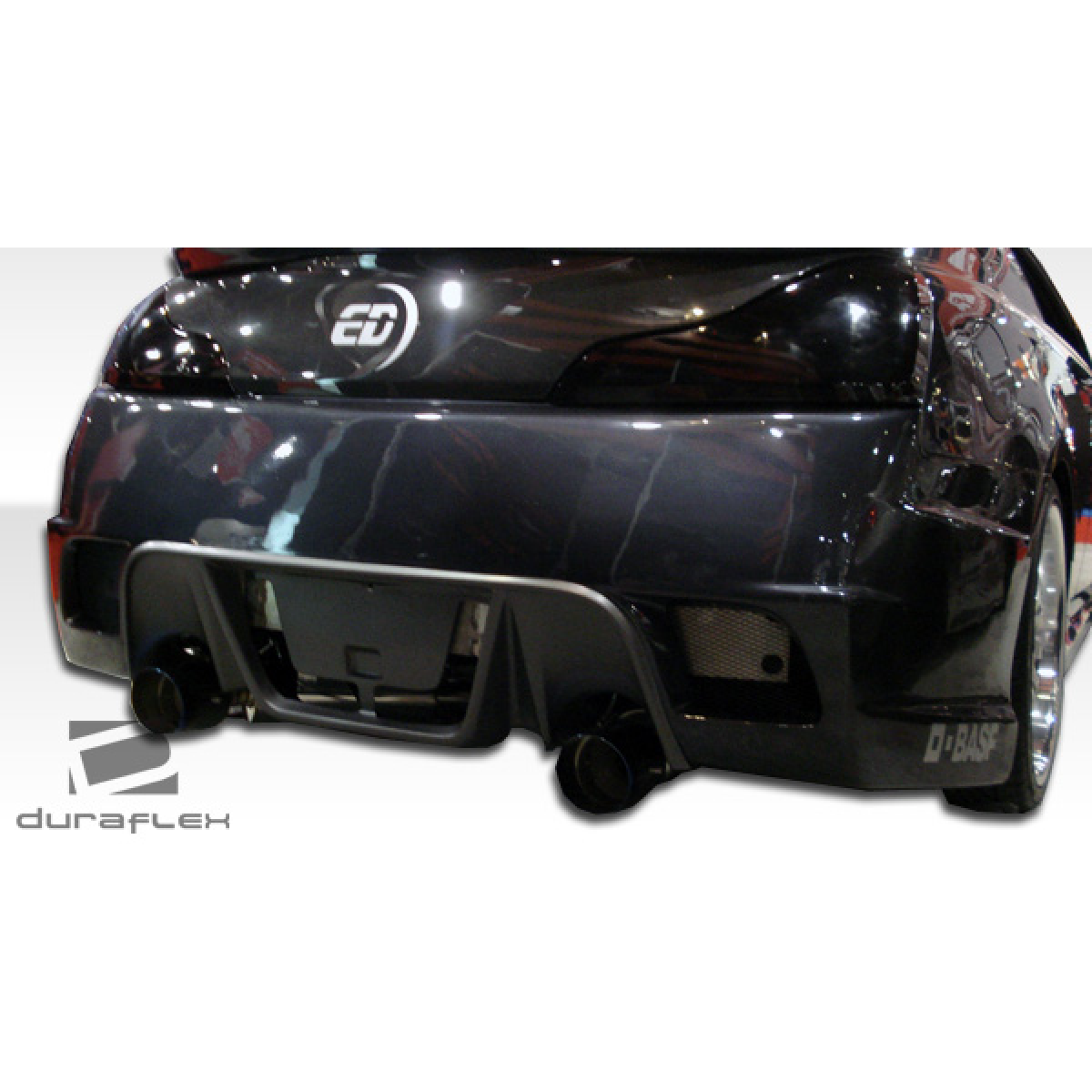 Modify your Infiniti G37 2008 with our Exterior/Complete Body Kits - Rear view at an angle showing the bumper design