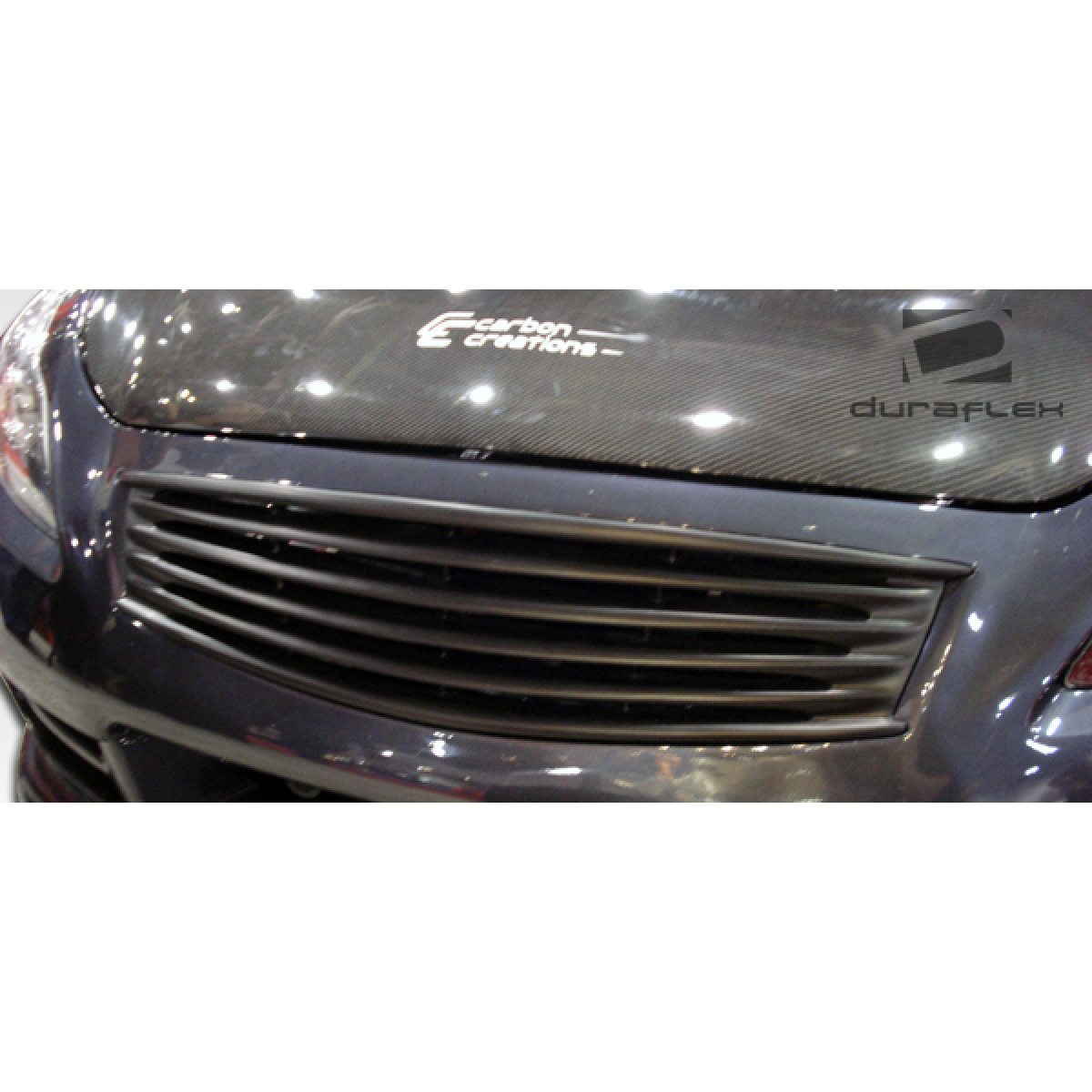 Modify your Infiniti G37 2008 with our Exterior/Grilles - Front view at a slight angle downward