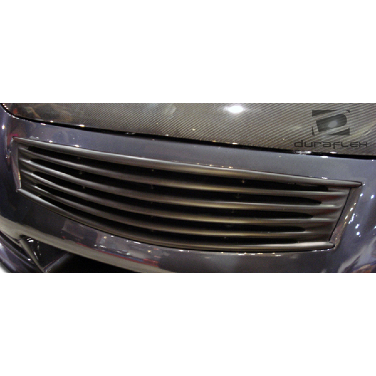 Modify your Infiniti G37 2008 with our Exterior/Grilles - Front view of car grille at slight angle