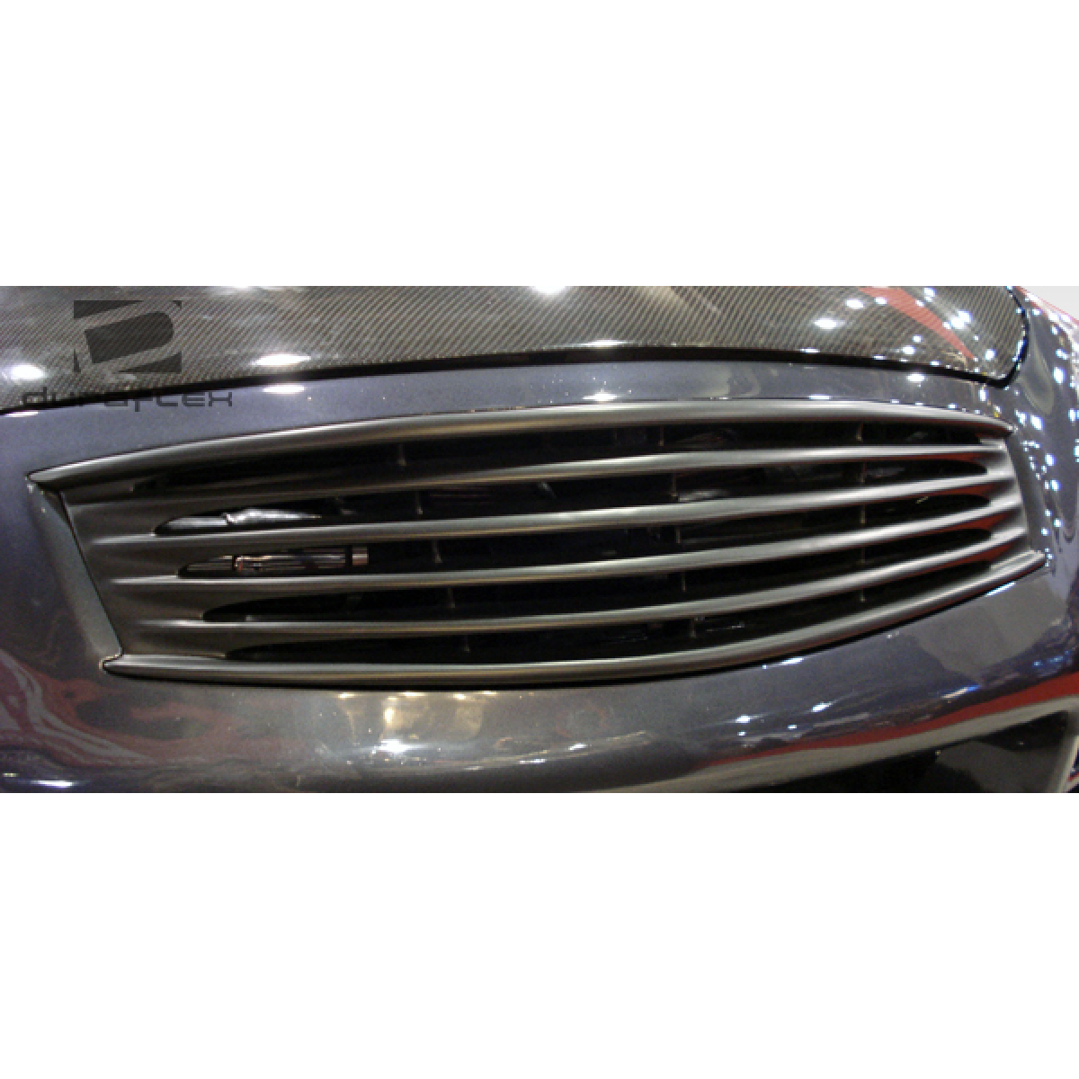 Modify your Infiniti G37 2008 with our Exterior/Grilles - Front view of grille at slight upward angle