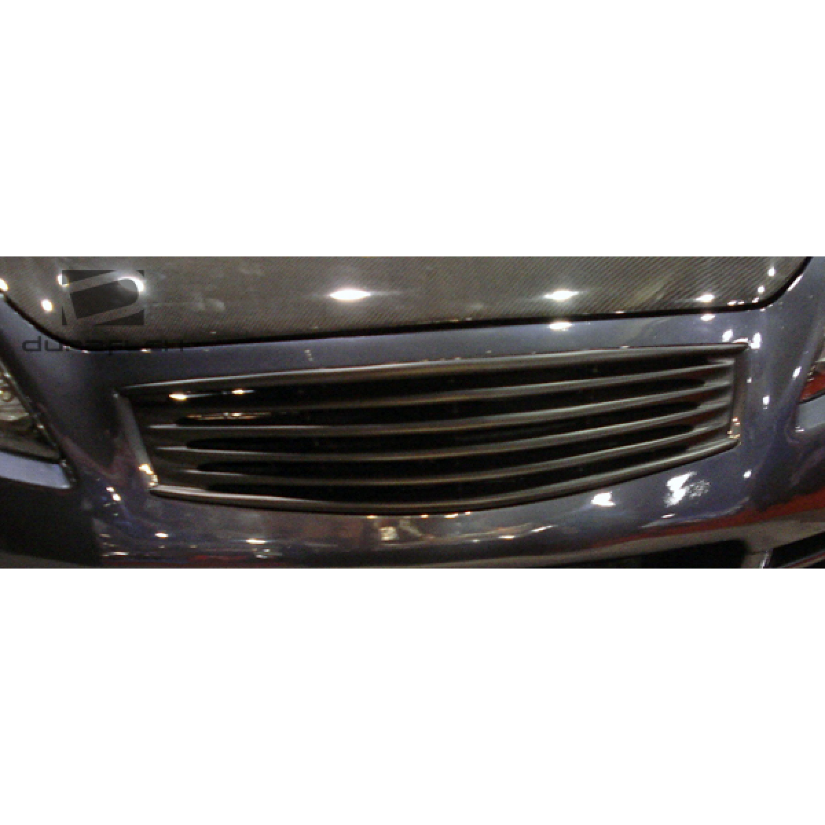 Modify your Infiniti G37 2008 with our Exterior/Grilles - Front view of grille from low angle