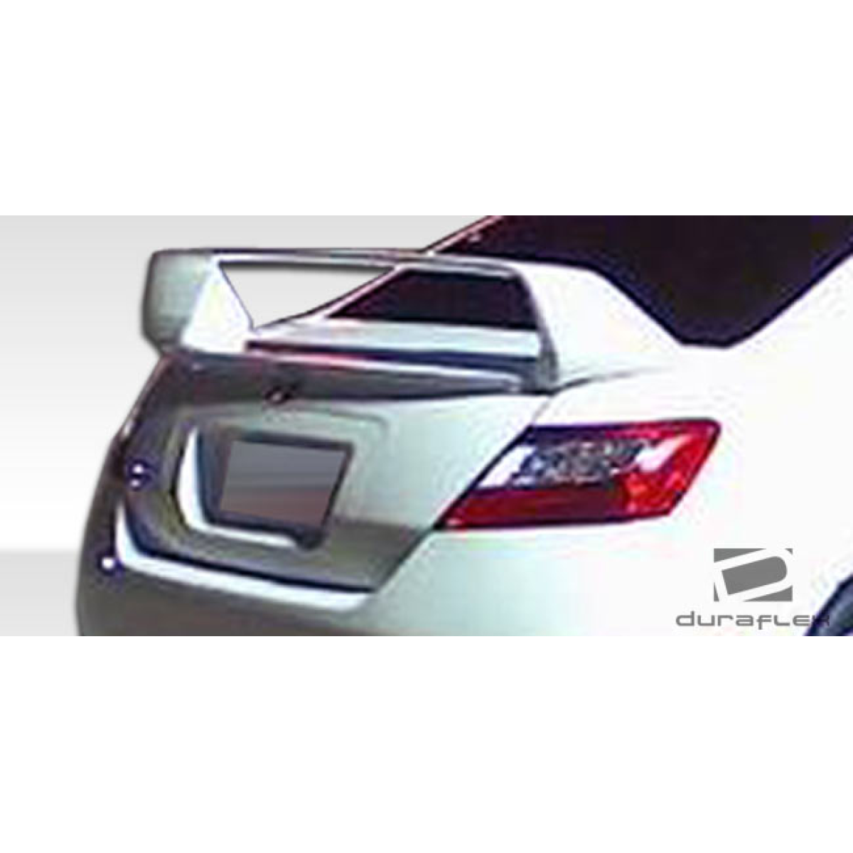 Modify your Honda Civic 2006 with our Exterior/Complete Body Kits - Rear angle showing wing and body kit design
