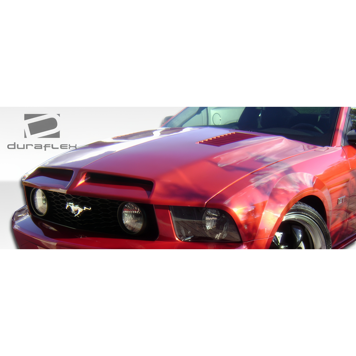 Modify your Ford Mustang 2005 with our Exterior/Hoods - Front angle close up of hood and grille area