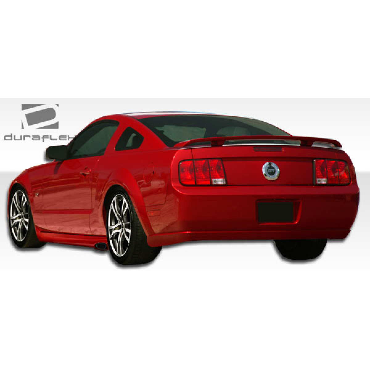 Modify your Ford Mustang 2005 with our Exterior/Complete Body Kits - Rear angle view of the vehicle showcasing the skirts