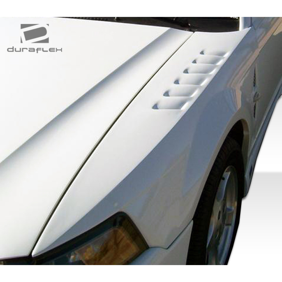 Modify your Ford Mustang 1999 with our Exterior/Fenders - Side angle showing fender design and vents