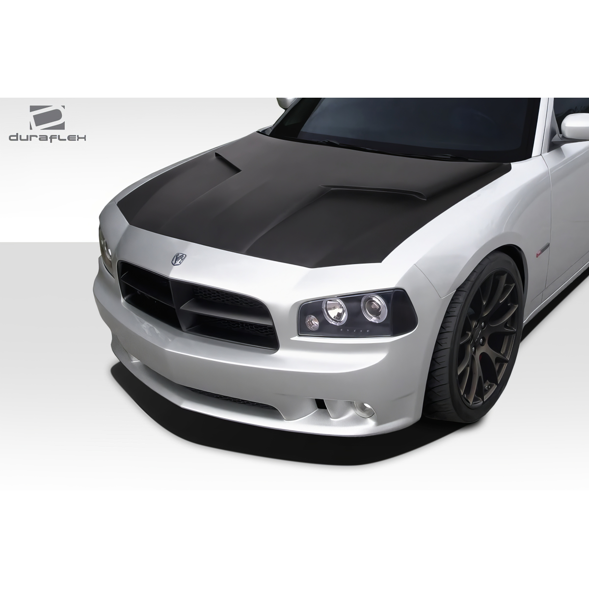 Modify your Dodge Charger 2006 with our Exterior/Hoods - Front angled view of a car hood