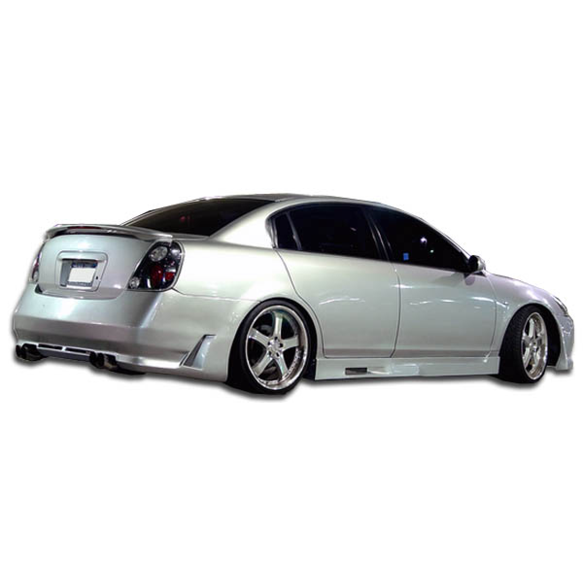 Modify your Nissan Altima 2002 with our Exterior/Rear Bumpers or Lips - Side view of rear bumper at slight angle