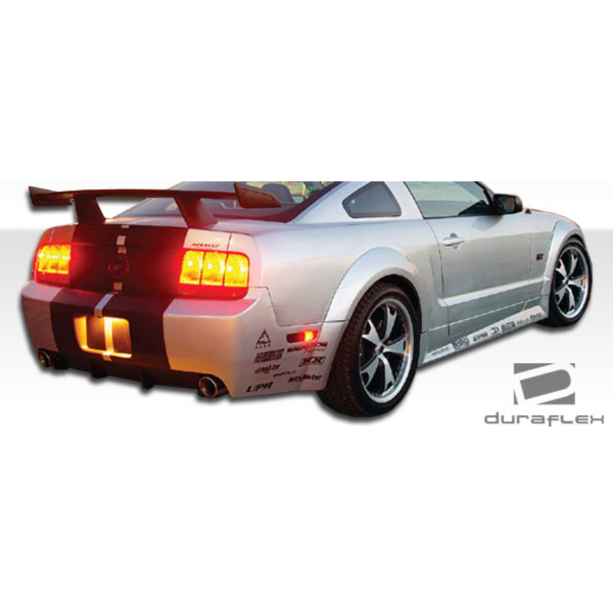 Modify your Ford Mustang 2005 with our Exterior/Side Skirts - Rear angle showing side skirts and rear design