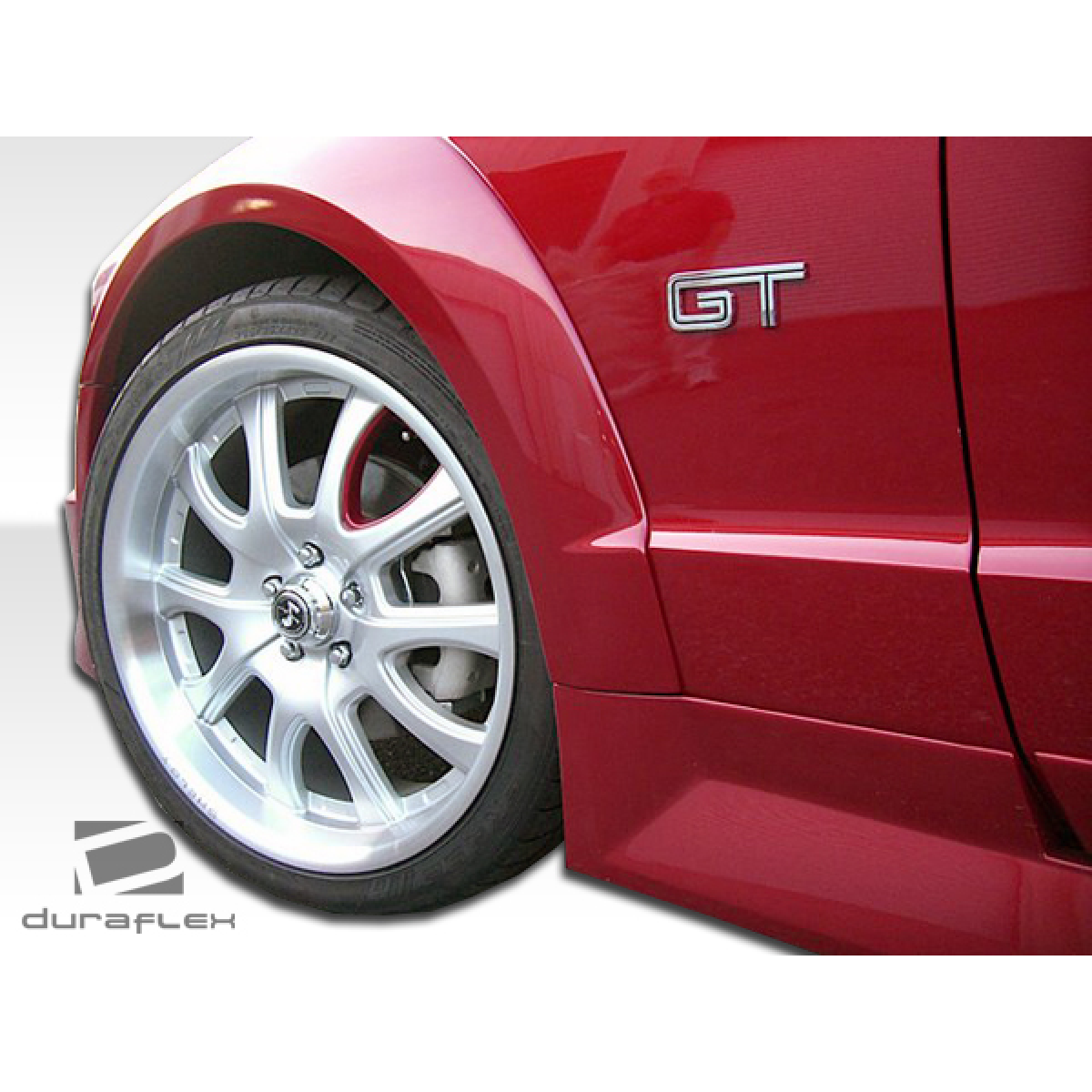 Modify your Ford Mustang 2005 with our Exterior/Fenders - Angle shows side view of fender and wheel assembly