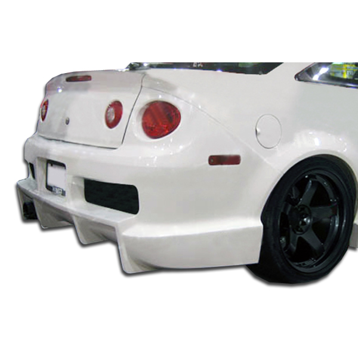 Modify your Chevrolet Cobalt 2005 with our Exterior/Rear Bumpers or Lips - Angle from rear showcasing bumper design