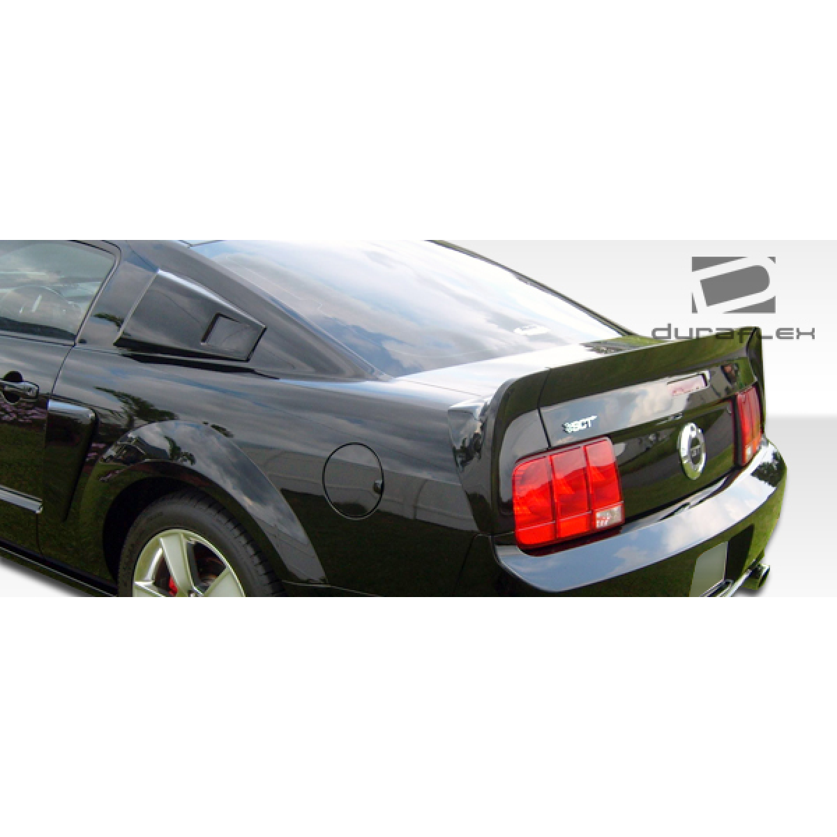 Modify your Ford Mustang 2005 with our Exterior/Scoops - The part is shown from a rear side angle